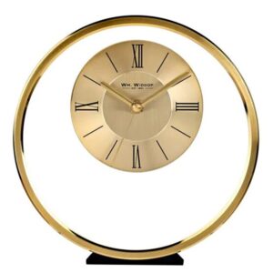 Stílusos és korszerű, csiszolt aranyszínű alumíniumból készült, kerek kandalló óra.