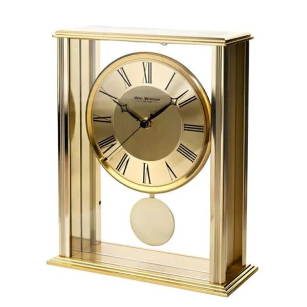 Stílusos és korszerű, csiszolt aranyszínű alumíniumból készült, ingás kandalló óra. A csillogó arany megjelenés kiemeli az óra gyönyörű kialakítását.