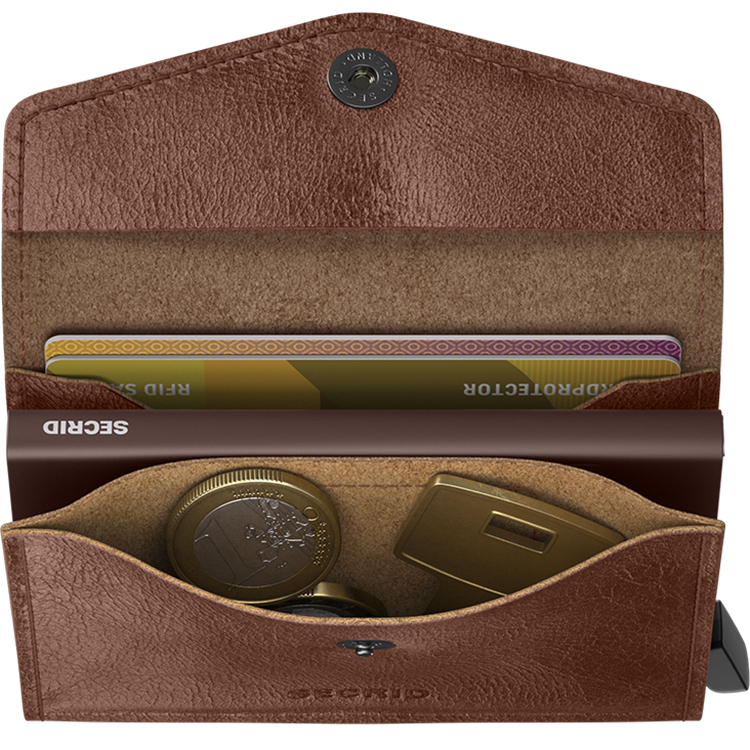 Secrid bankkártyatartó - Envelope Vintage Cognac. Minimalista forma, maximális funkcionalitás. A Secrid Envelope Vintage elegáns megjelenésével és okos kialakításával tökéletes választás azoknak, akik kompakt, mégis praktikus pénztárcát keresnek a mindennapokra.