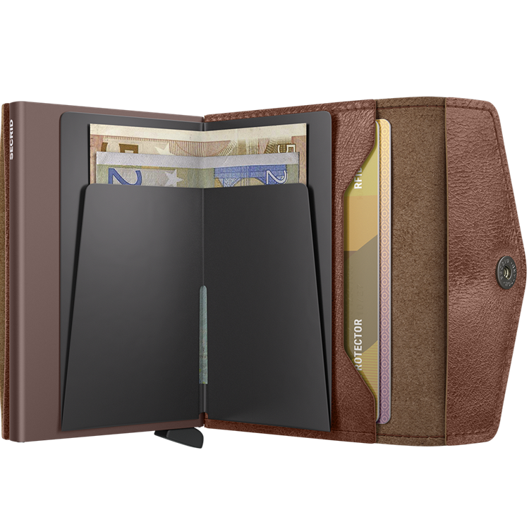 Secrid bankkártyatartó - Envelope Vintage Cognac. Minimalista forma, maximális funkcionalitás. A Secrid Envelope Vintage elegáns megjelenésével és okos kialakításával tökéletes választás azoknak, akik kompakt, mégis praktikus pénztárcát keresnek a mindennapokra.